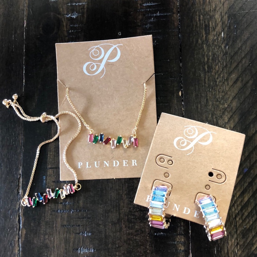 Necklace, bracelet, and earrings.